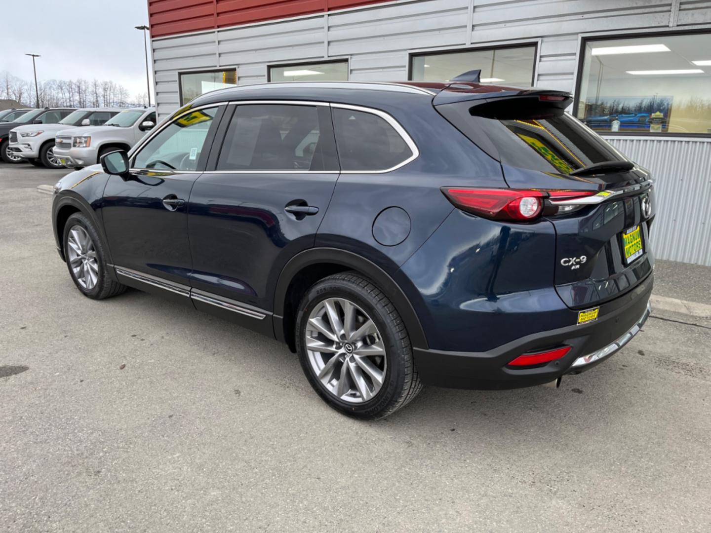 2021 Blue Mazda CX-9 Grand Touring AWD (JM3TCBDY8M0) with an 2.5L L4 DOHC 16V engine, 6A transmission, located at 1960 Industrial Drive, Wasilla, 99654, (907) 274-2277, 61.573475, -149.400146 - Photo#3